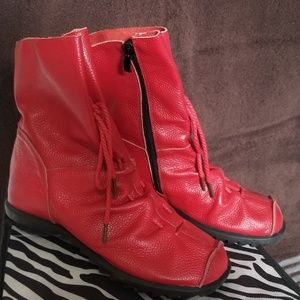 Red pleather zip up boots.